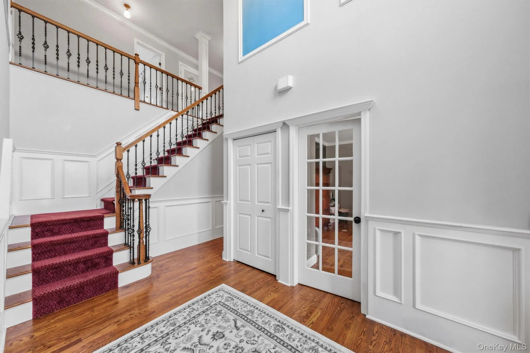 Enjoy a full home office (on the right), along with a large coat closet and easy access to the second floor. Enjoy a full home office (on the right), along with a large coat closet and easy access to the second floor.