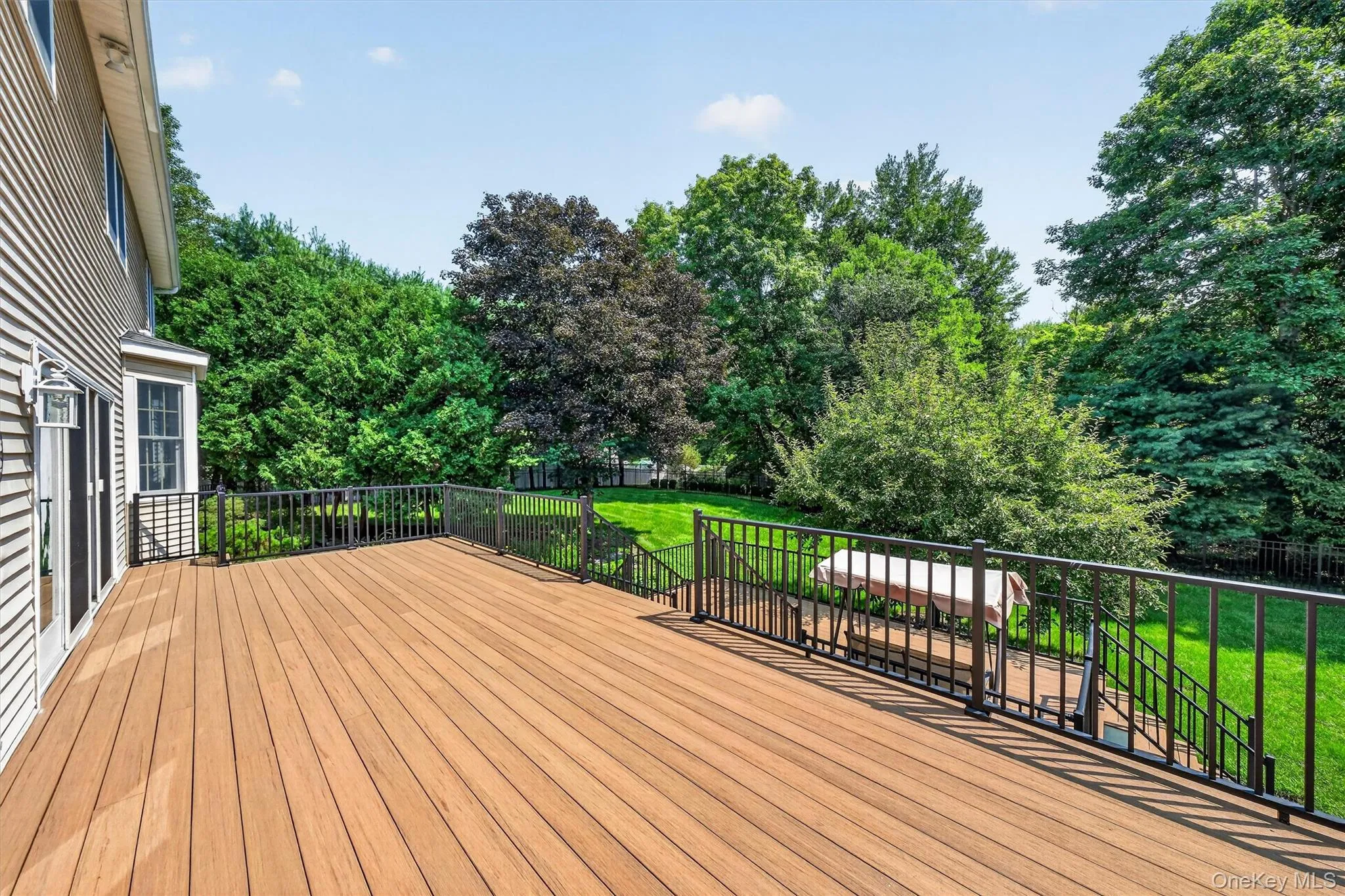The deck runs the full length of the house! The deck runs the full length of the house!