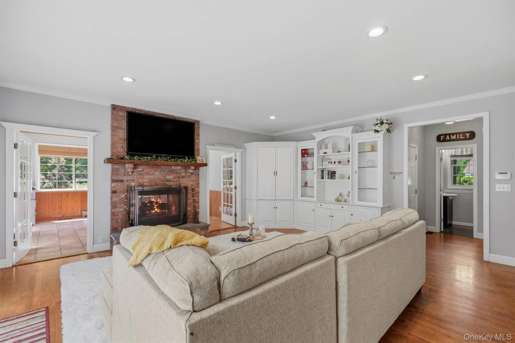 A more casual family room offers a place to watch TV by another (two-sided) gas fireplace. A more casual family room offers a place to watch TV by another (two-sided) gas fireplace.