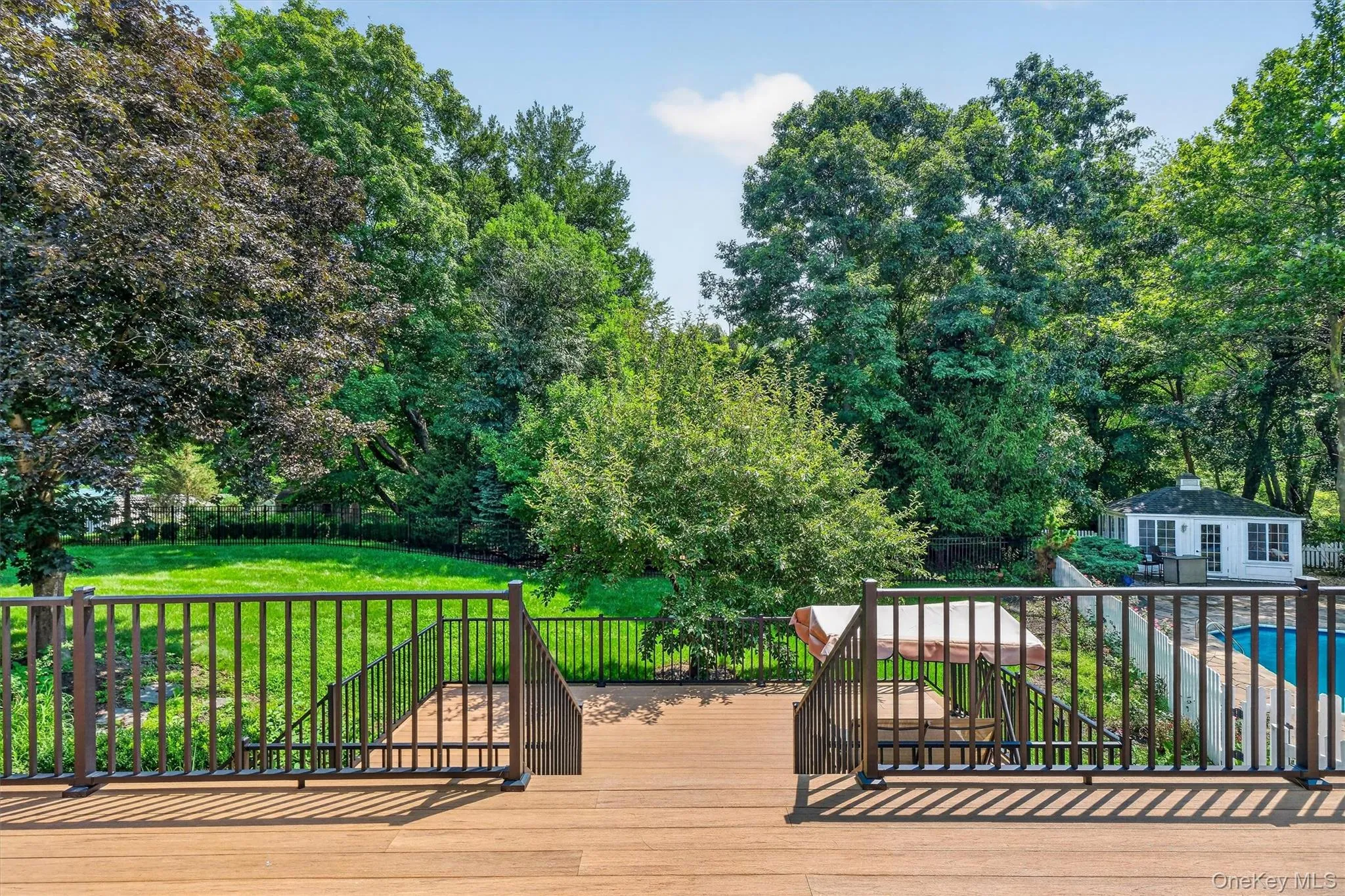 A set of stairs to the lower-level of the deck. A set of stairs to the lower-level of the deck.