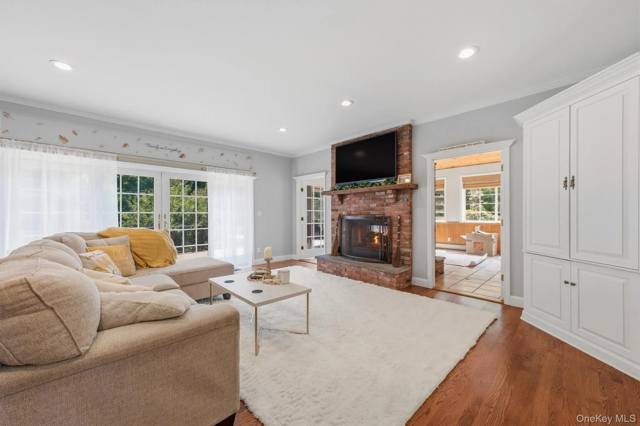 The family room features sliding glass doors that open to a two-tiered deck, as well as convenient access to an all-season sunporch. The family room features sliding glass doors that open to a two-tiered deck, as well as convenient access to an all-season sunporch.