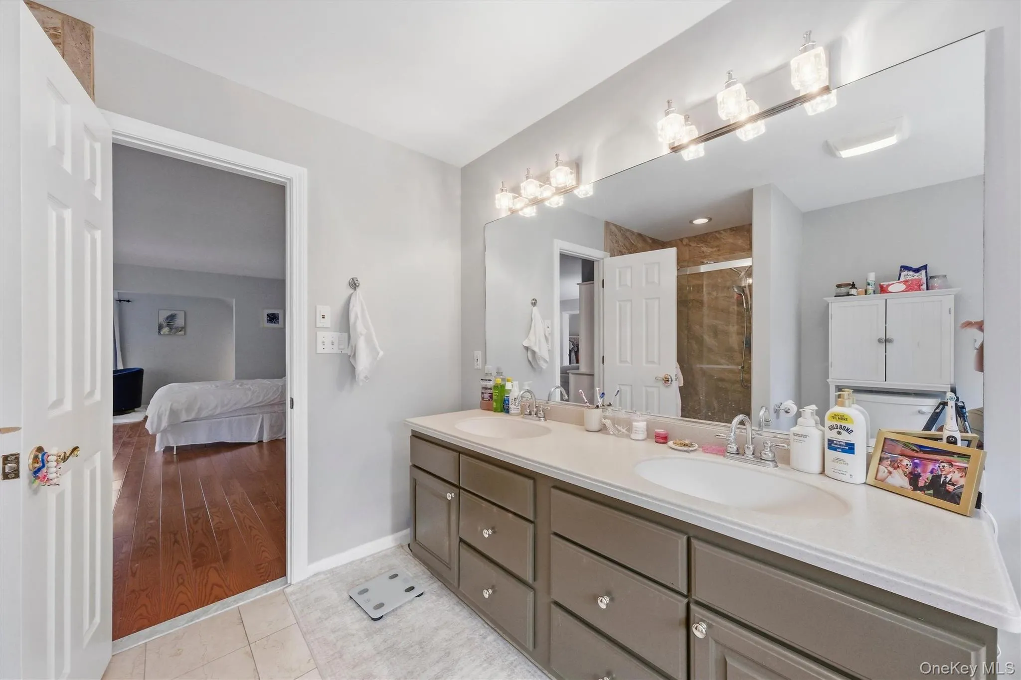 Primary bath with his and her sinks, a soaking tub and a shower. Primary bath with his and her sinks, a soaking tub and a shower.