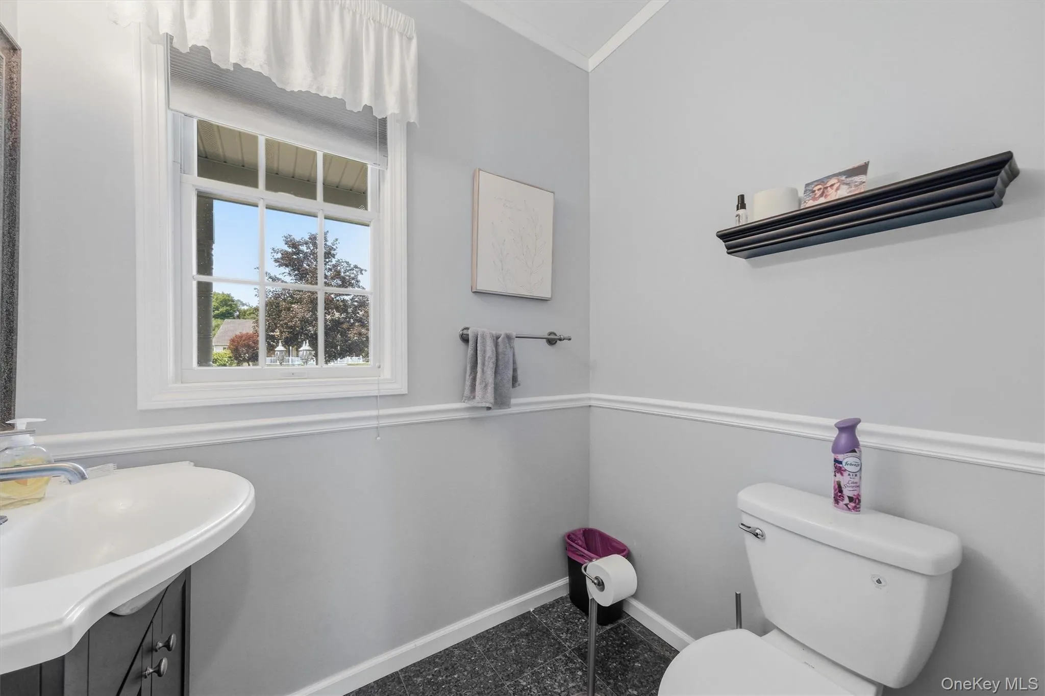 An updated half bath completes the first floor. An updated half bath completes the first floor.