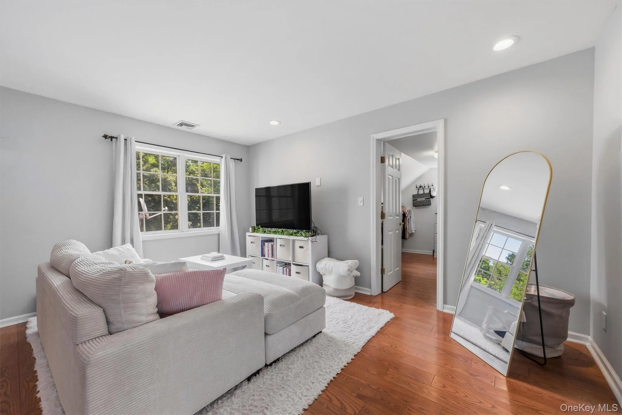 The primary bedroom is large enough for a separate lounging area. The primary bedroom is large enough for a separate lounging area.