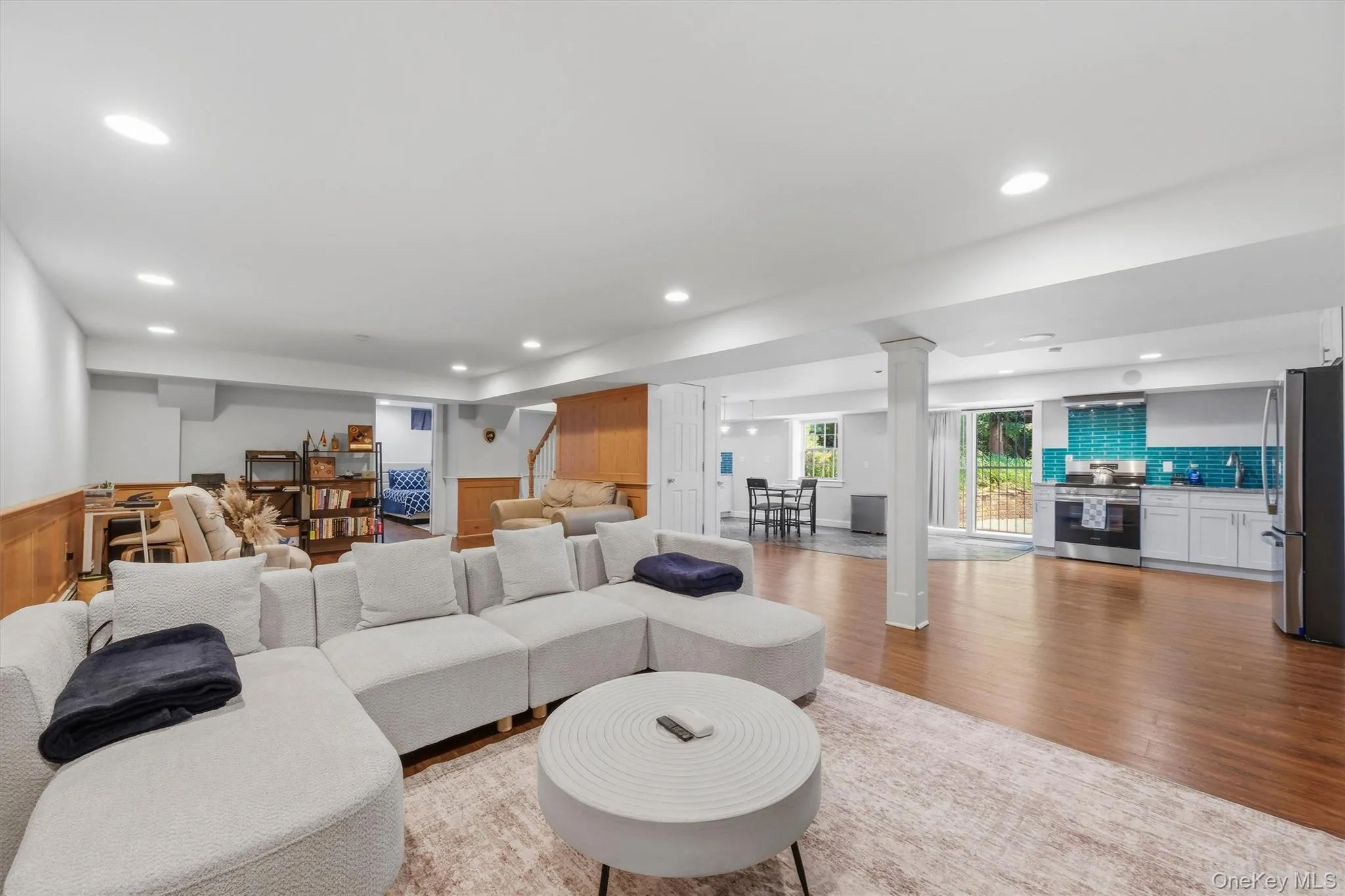 This basement offers a long list of conveniences for overnight guests or live-in childcare. This basement offers a long list of conveniences for overnight guests or live-in childcare.
