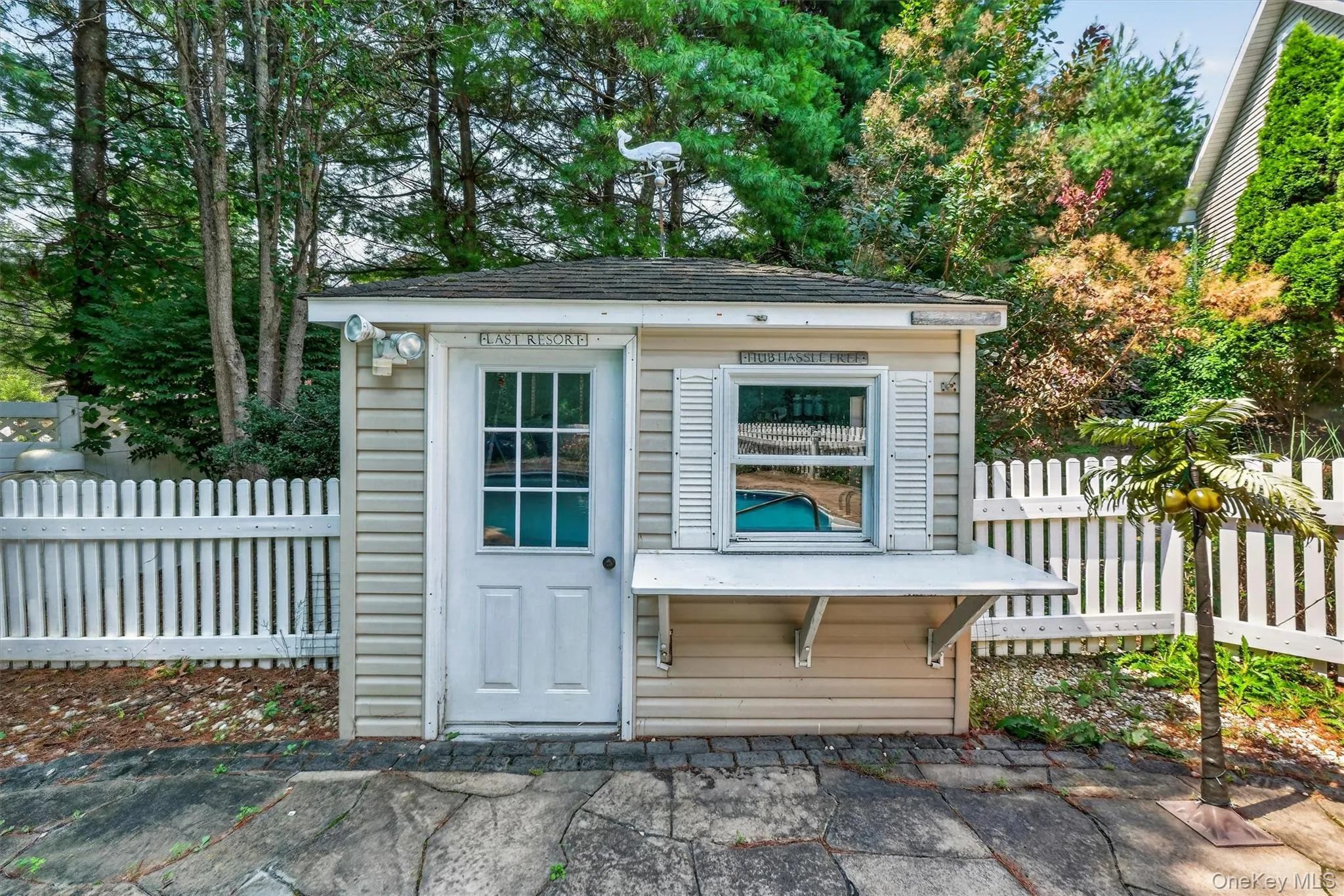 An additional pool shed offers convenient storage for pool equipment, maintenance supplies and floats. An additional pool shed offers convenient storage for pool equipment, maintenance supplies and floats.