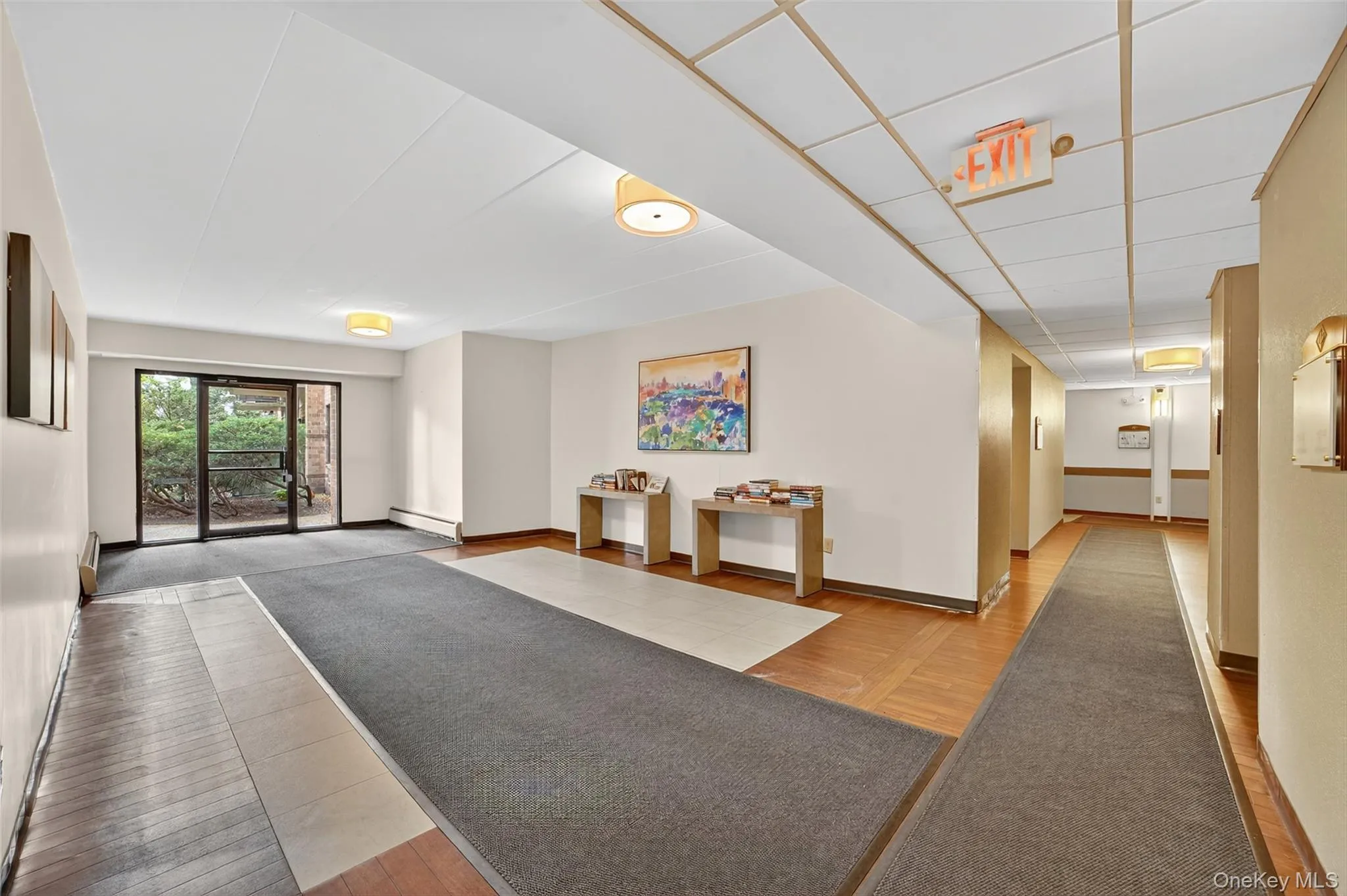 Common area with a paneled ceiling Common area with a paneled ceiling