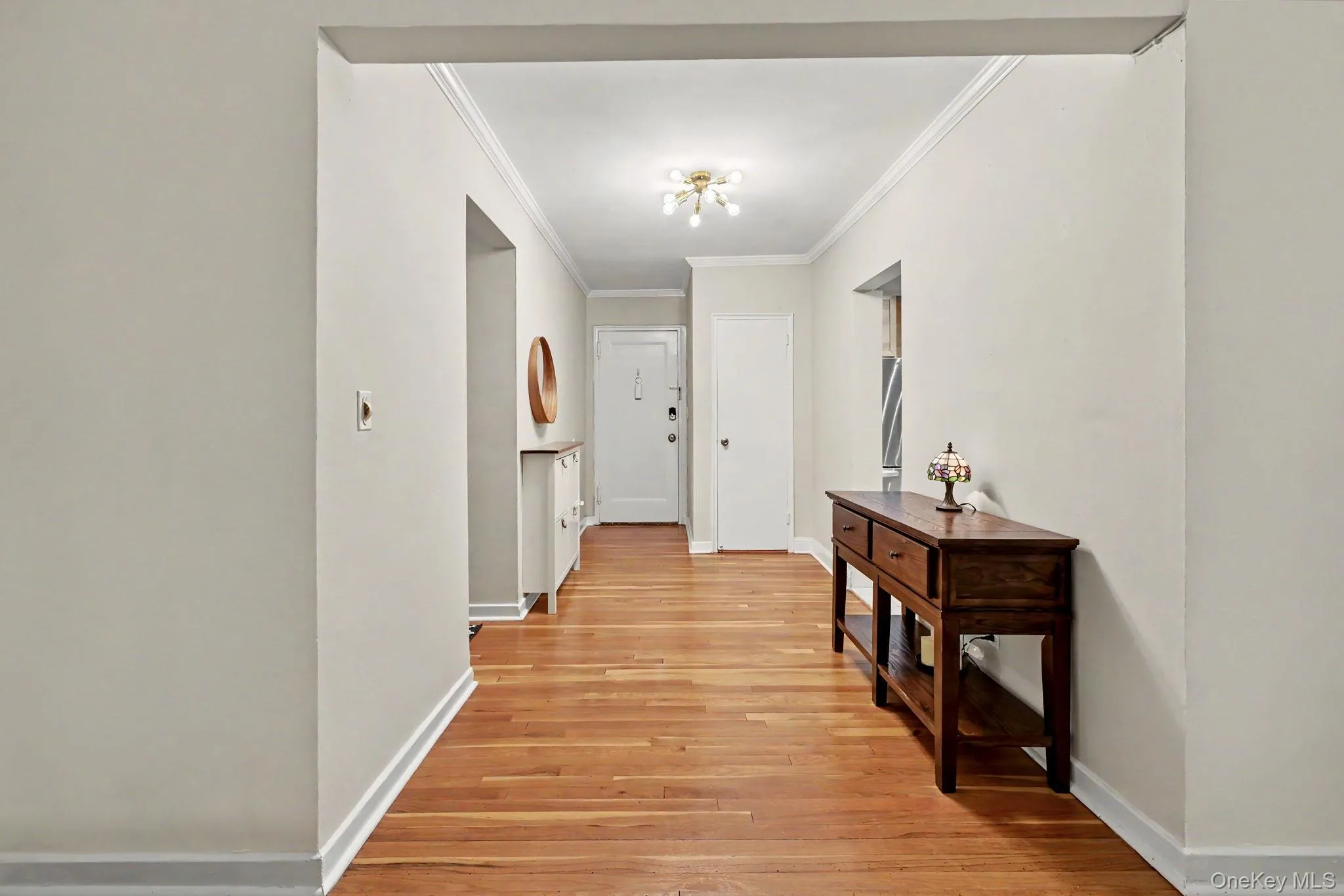 Looking back toward the front door and hall closet. Looking back toward the front door and hall closet.