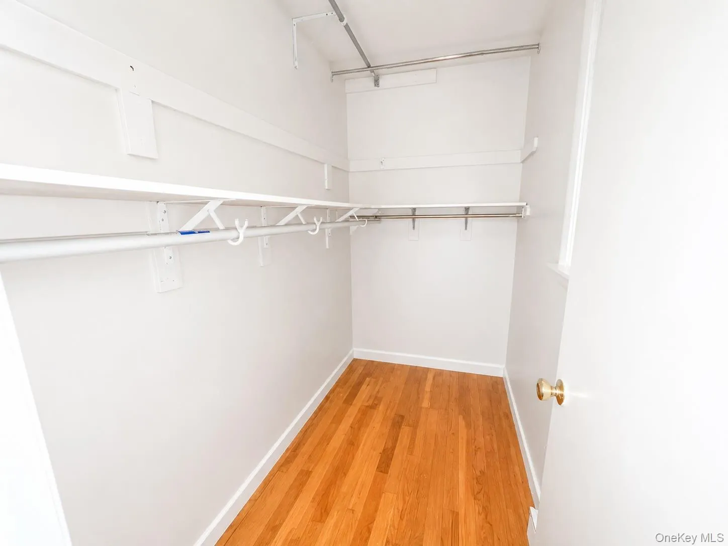 Spacious bedroom walk-in closet Spacious bedroom walk-in closet