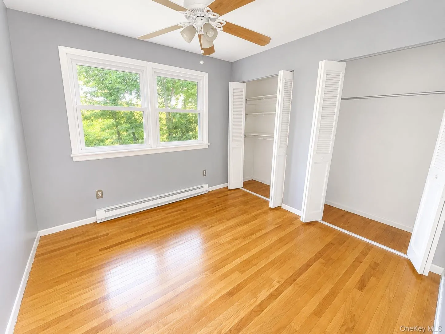 Hardwood flooring extending throughout the room Hardwood flooring extending throughout the room