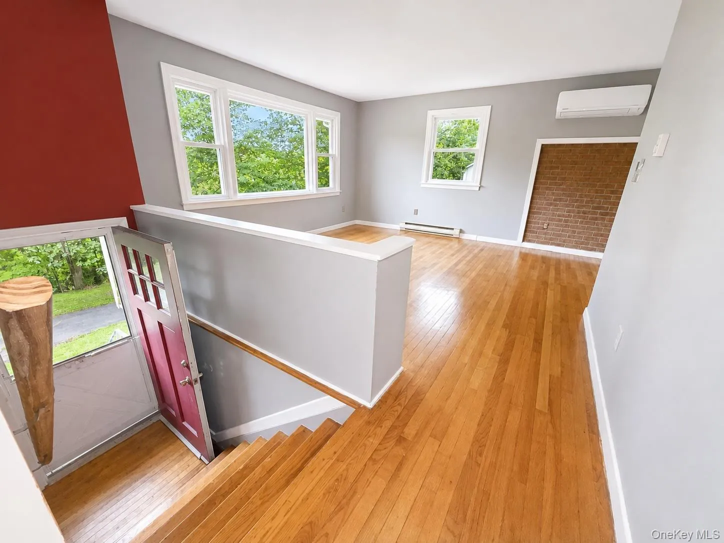 Entrance, showcasing hardwood floors Entrance, showcasing hardwood floors