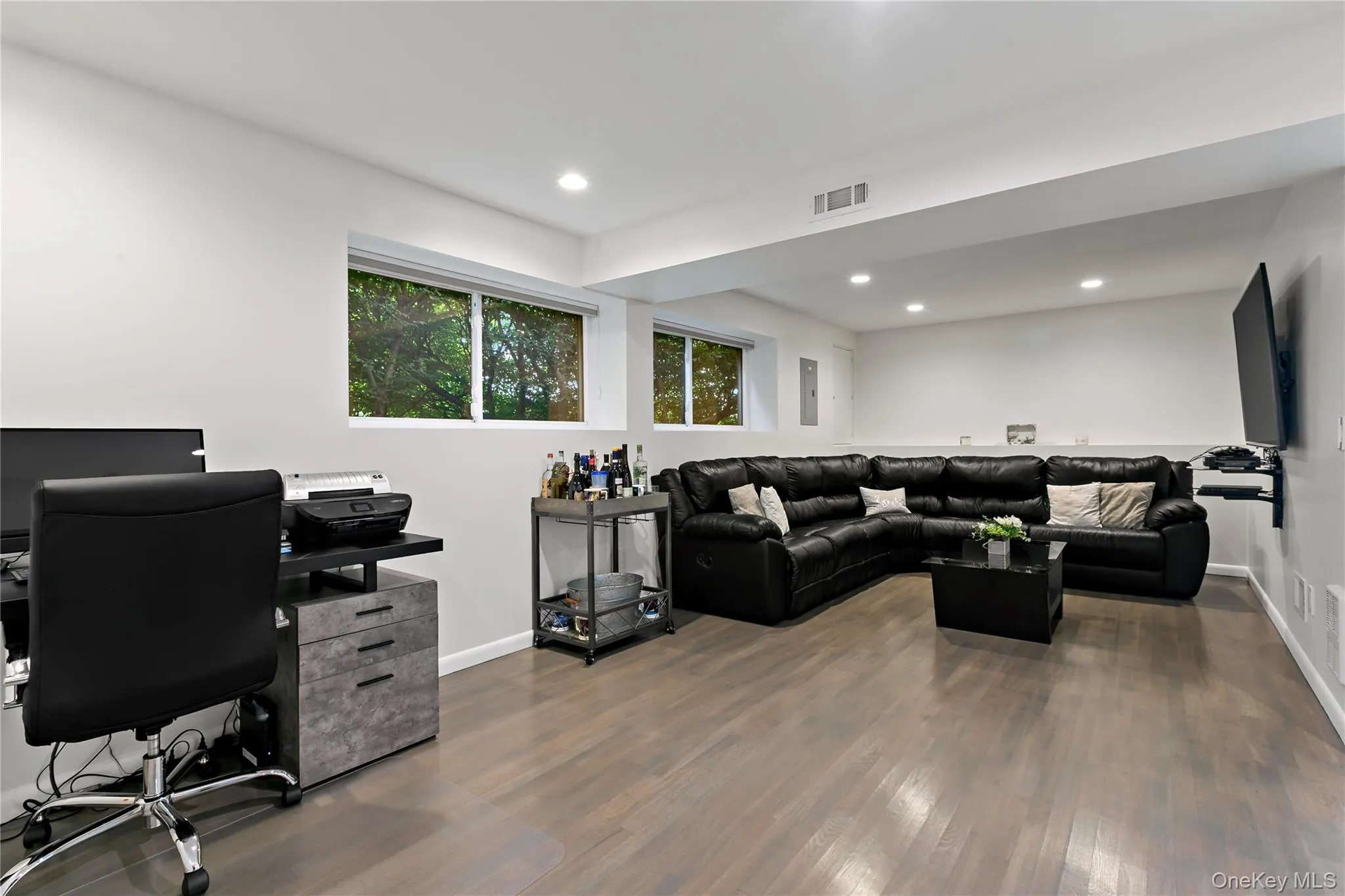 Expansive family room. Enough room for an office and recreation. Expansive family room. Enough room for an office and recreation.