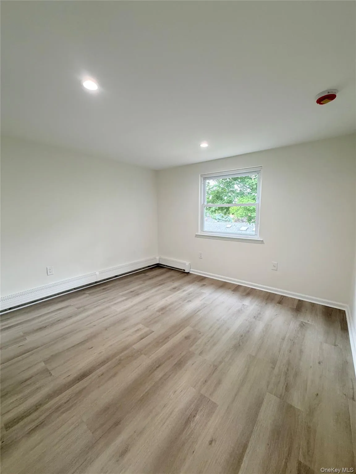 Spacious 2nd bedroom with closet space. Spacious 2nd bedroom with closet space.