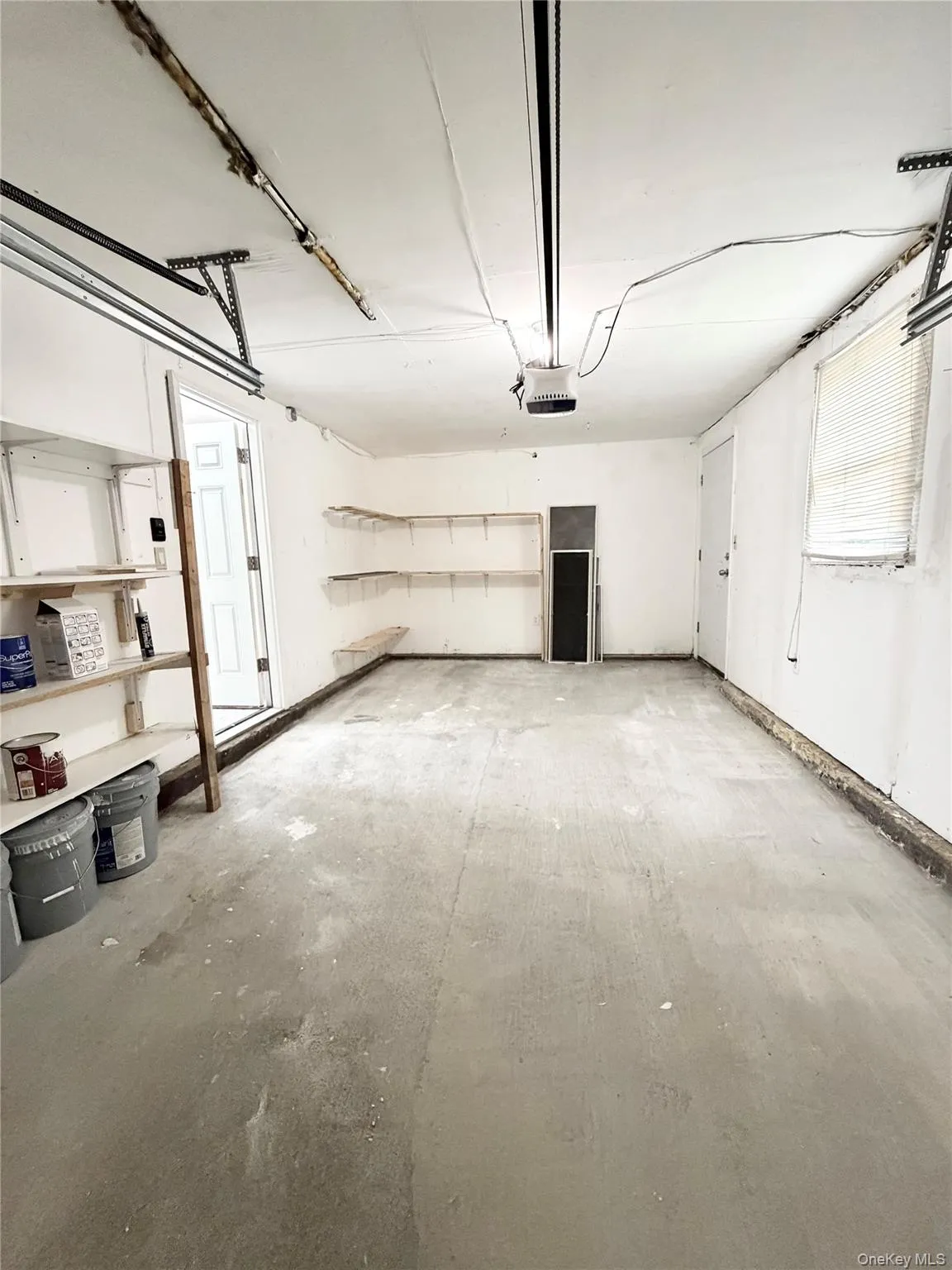 Ample one car garage with interior access. Ample one car garage with interior access.