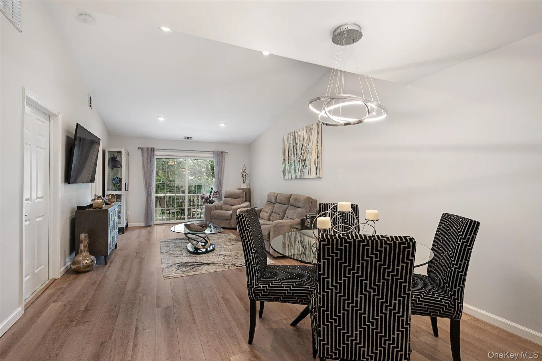 Open Floor Plan w/ Luxury Vinyl Flooring and Sliders To Terrace/Deck Open Floor Plan w/ Luxury Vinyl Flooring and Sliders To Terrace/Deck
