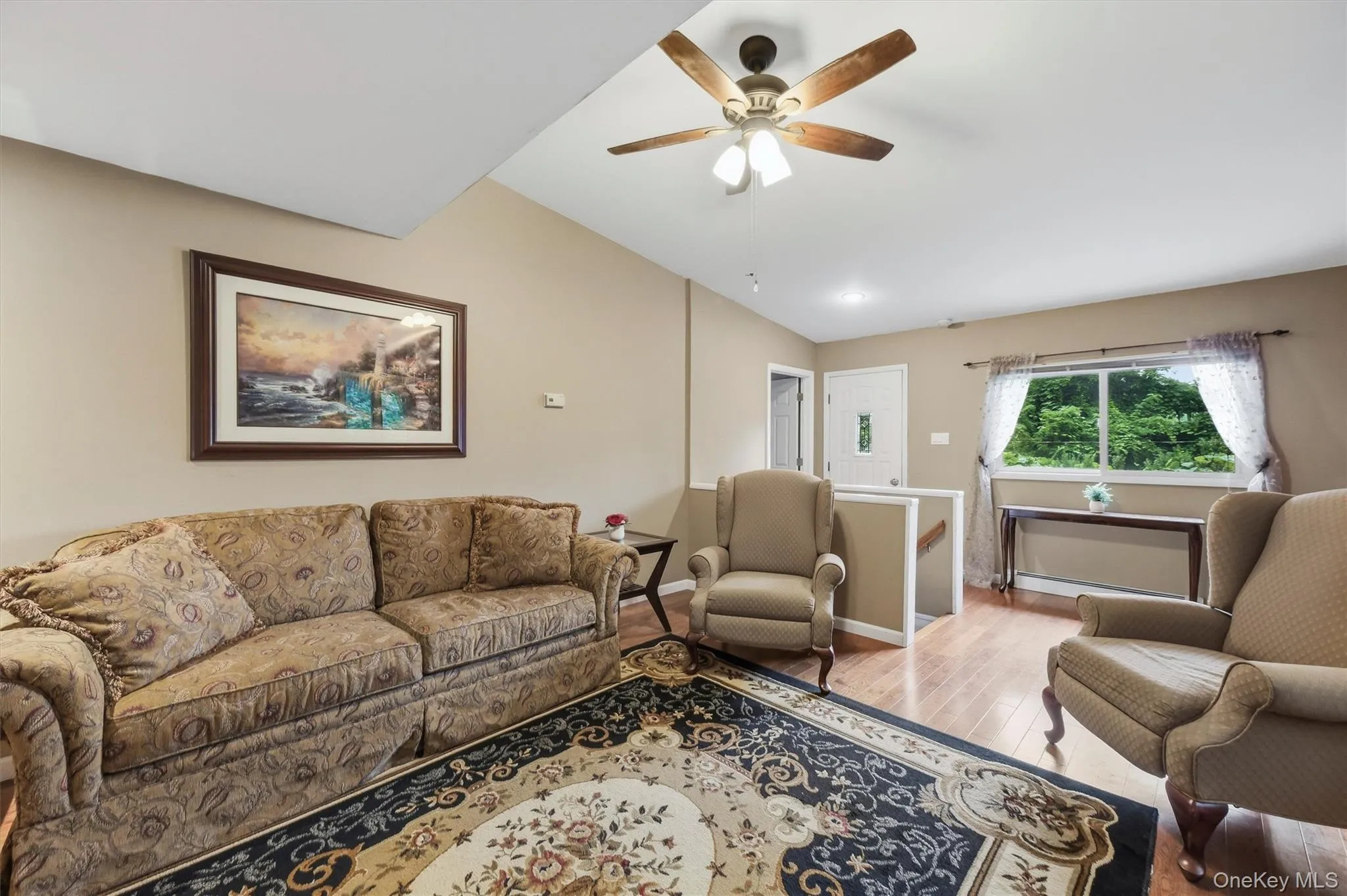 Living room with a neutral color palette and contemporary style cathedral ceiling Living room with a neutral color palette and contemporary style cathedral ceiling