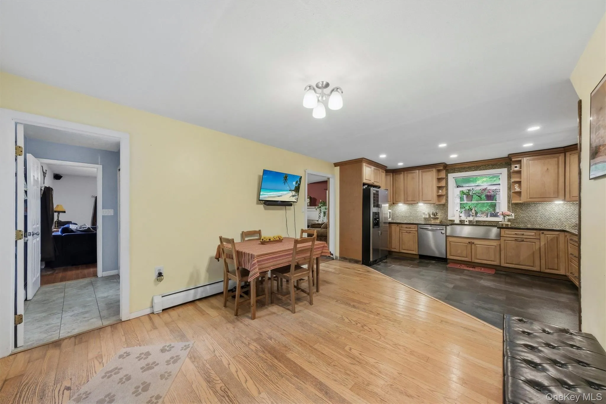 Hardwood floors adorn the entry into the home Hardwood floors adorn the entry into the home