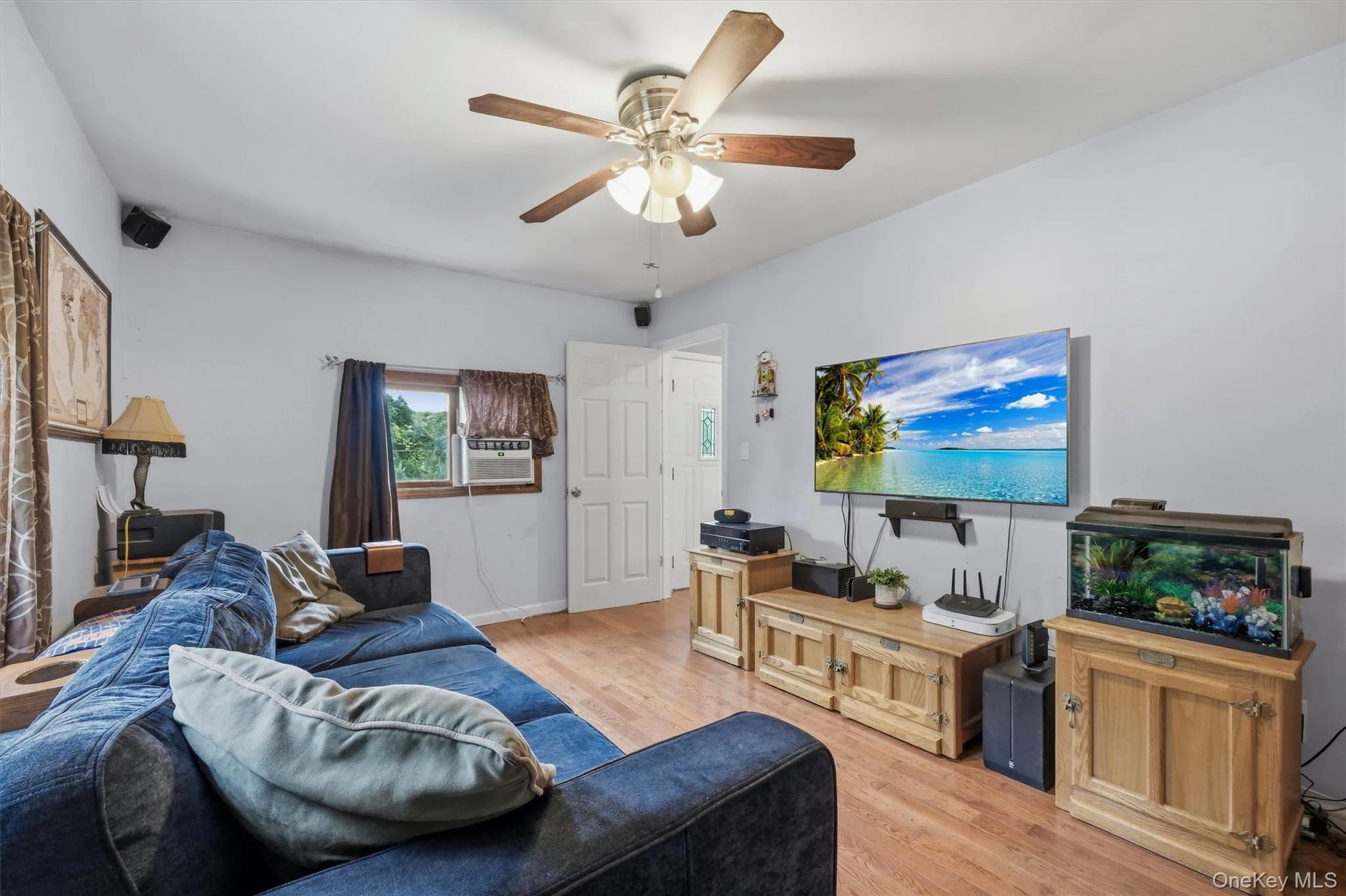 The main floor bedroom is presently used as a family room The main floor bedroom is presently used as a family room