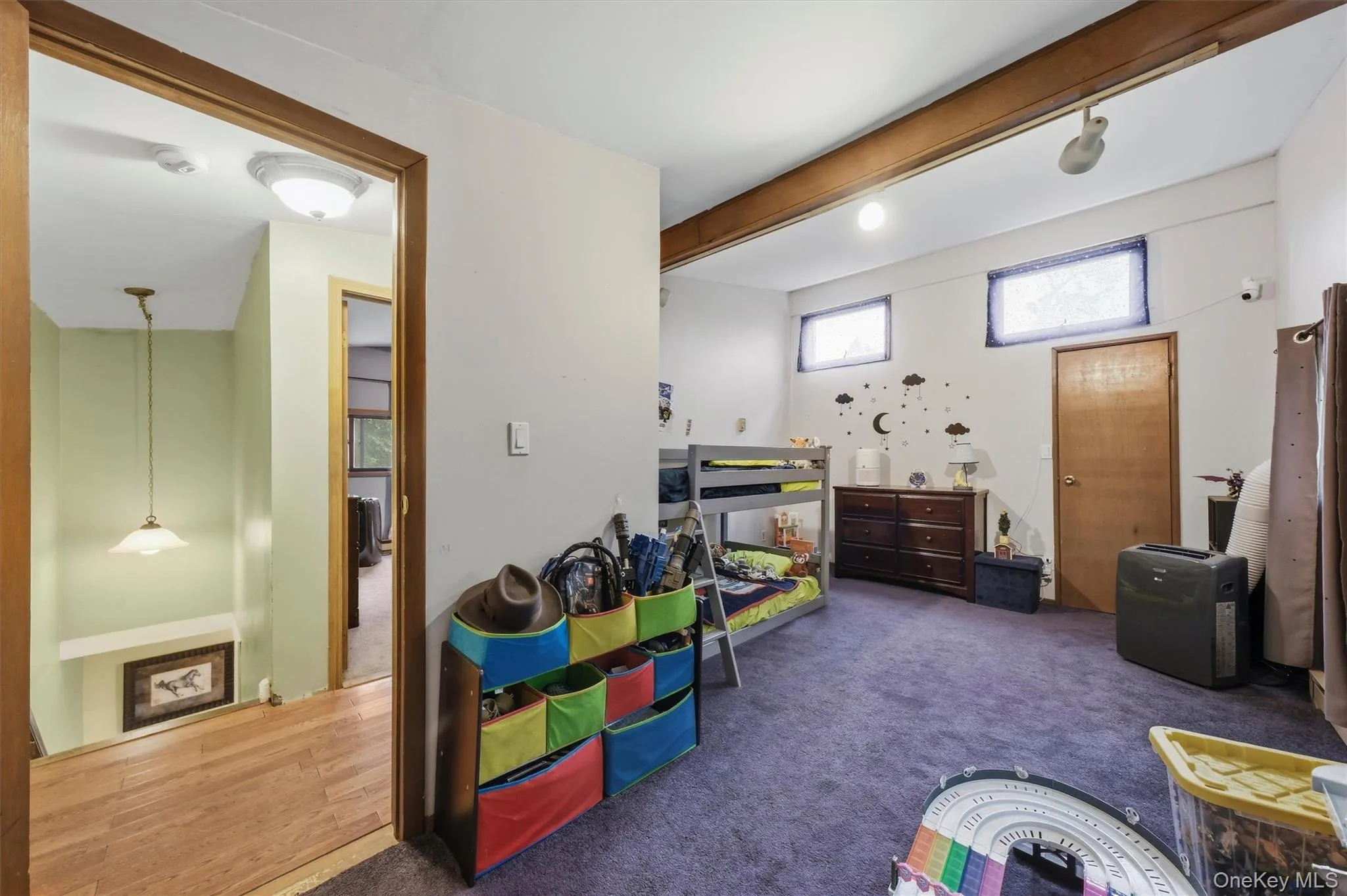 Carpet brings a level of quiet to the room. Carpet brings a level of quiet to the room.