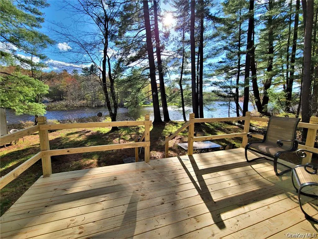 Wooden deck with a water view Wooden deck with a water view