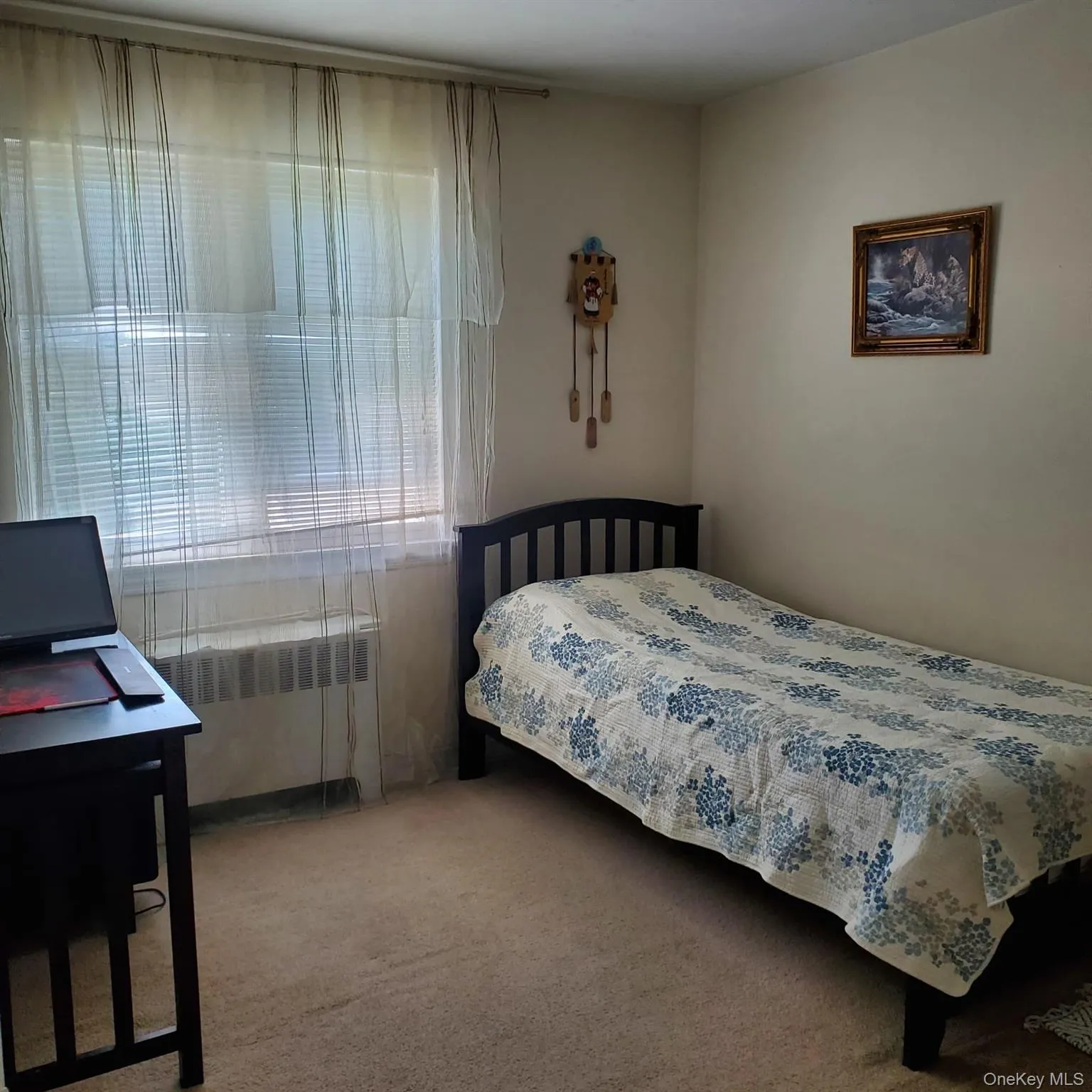 Room featuring light-colored walls Room featuring light-colored walls