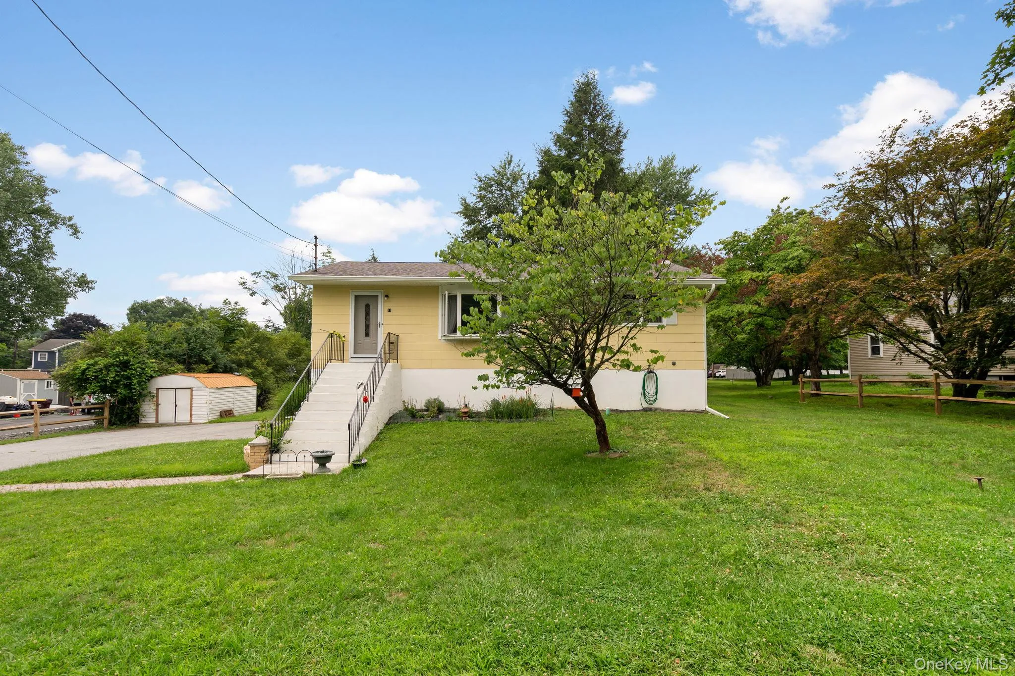 Level yard space and storage shed. Level yard space and storage shed.