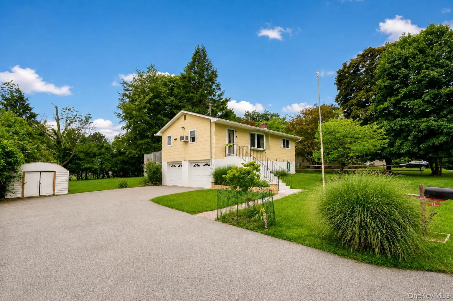Providing ample driveway space and garage. Providing ample driveway space and garage.