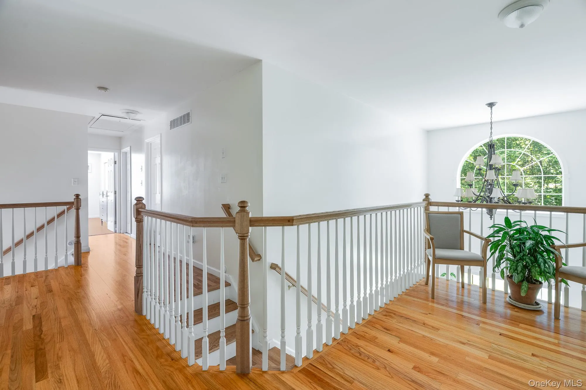 Spacious upper foyer with balcony and back stair case Spacious upper foyer with balcony and back stair case