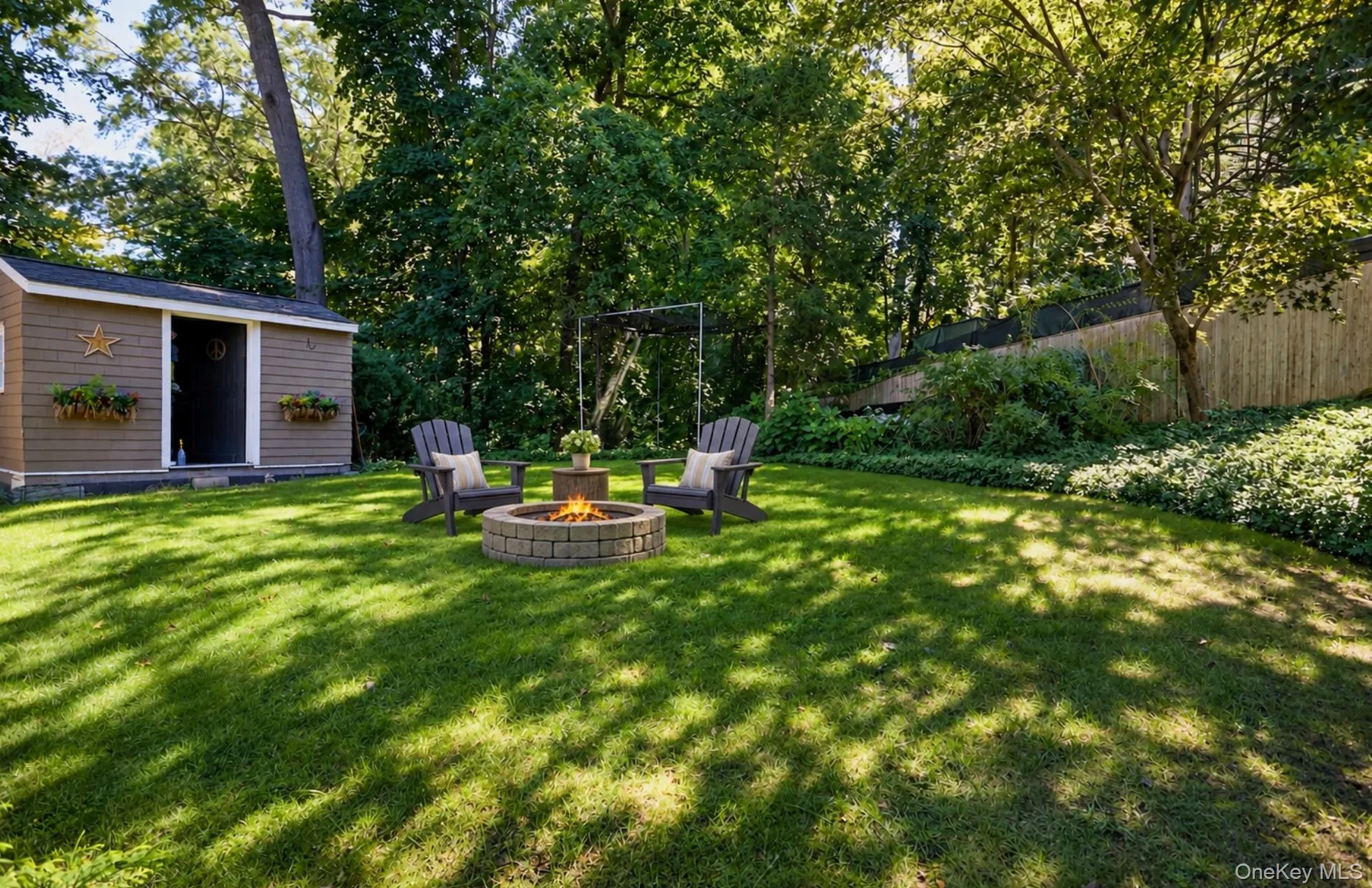 Flat Yard with virtually staged chairs & firepit Flat Yard with virtually staged chairs & firepit