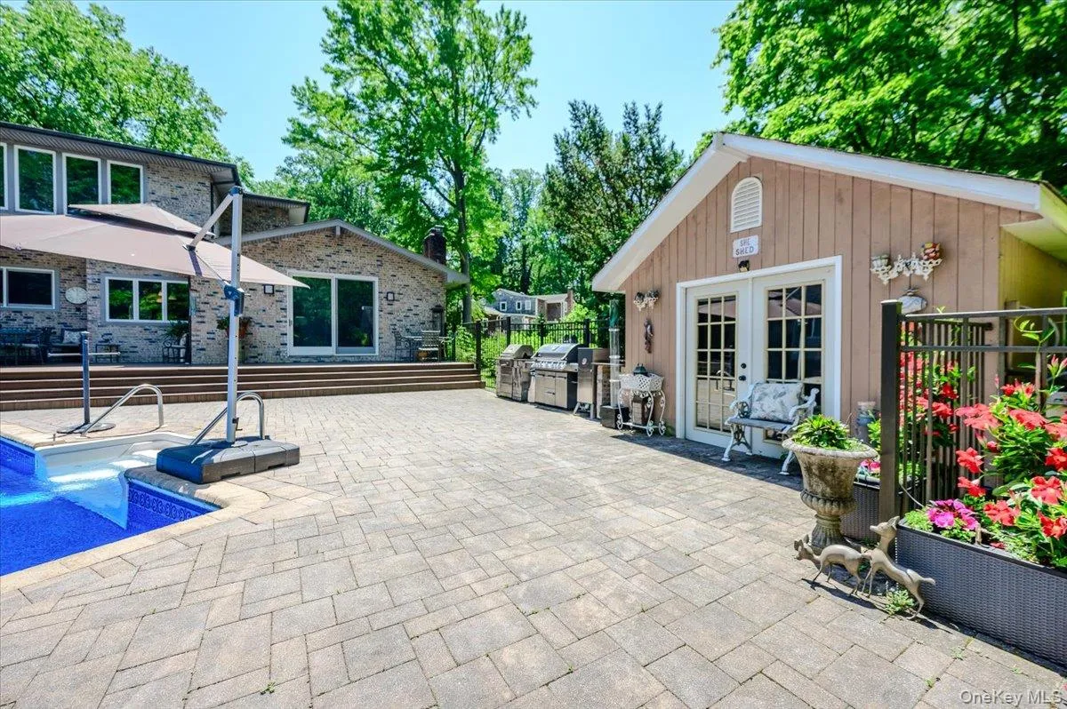 Patio around Pool & Storage cabana Patio around Pool & Storage cabana