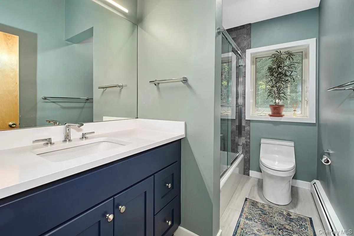 Updated hall bath. Updated hall bath.
