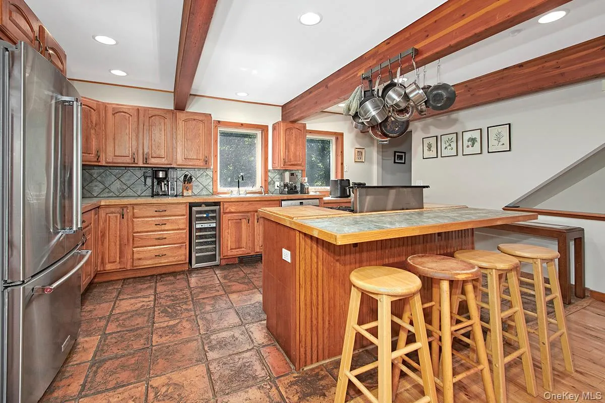 Kitchen with cooking island. Kitchen with cooking island.