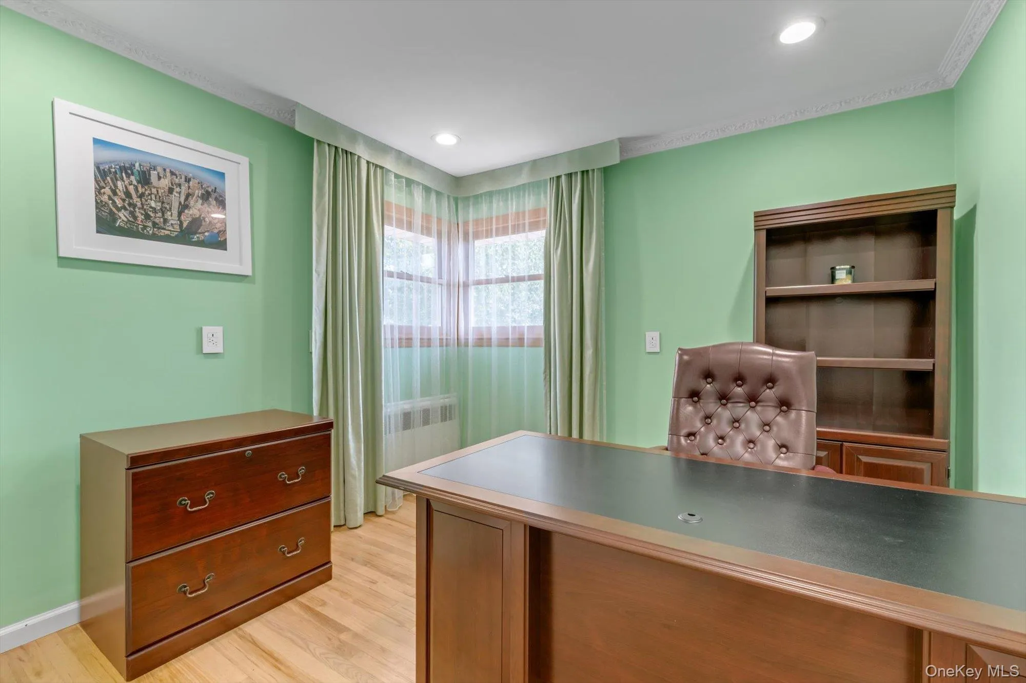 Bedroom set up as an office with Recessed lighting, and crown molding Bedroom set up as an office with Recessed lighting, and crown molding
