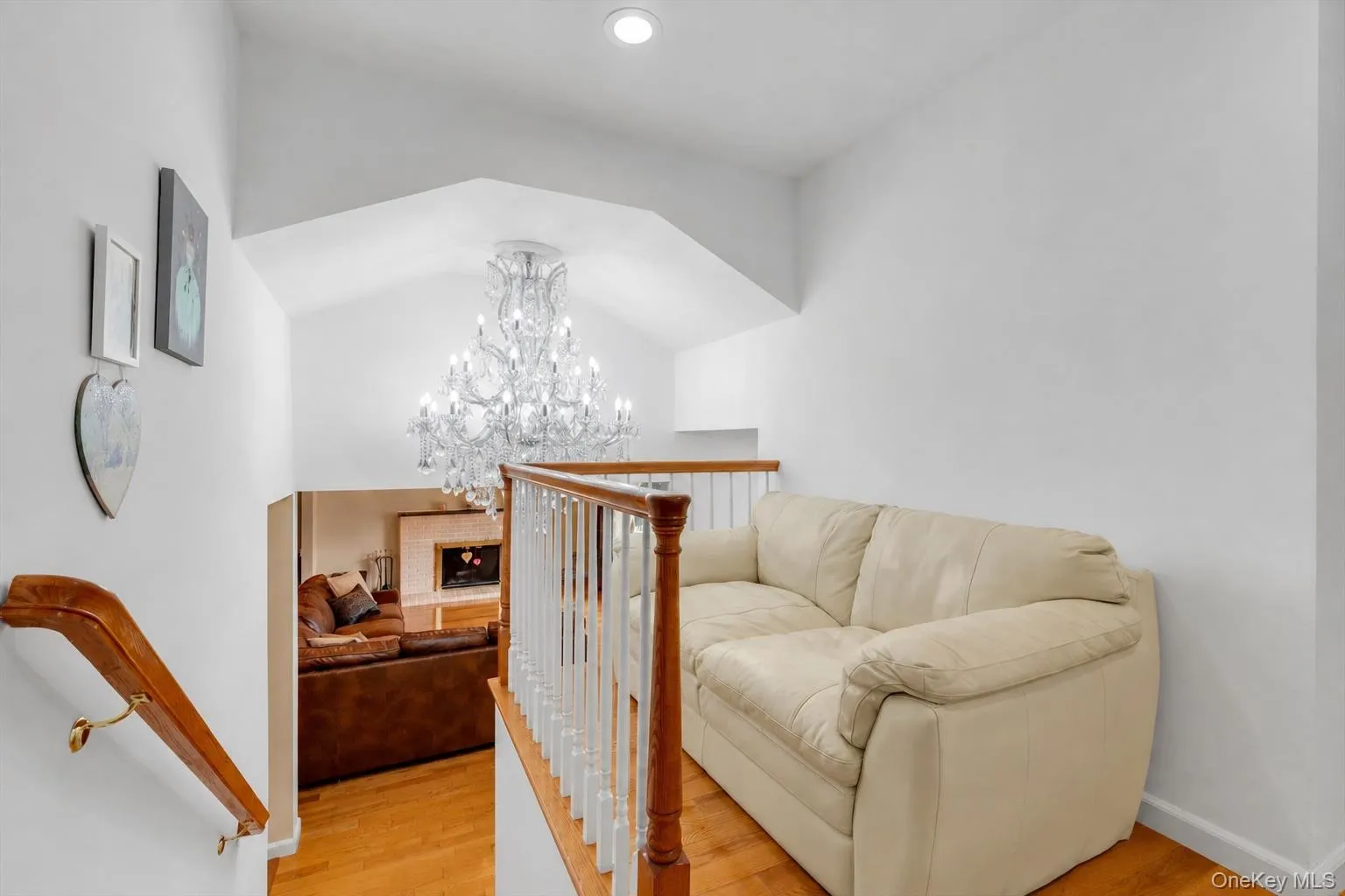 Entry way with giant chandelier to upstairs Entry way with giant chandelier to upstairs