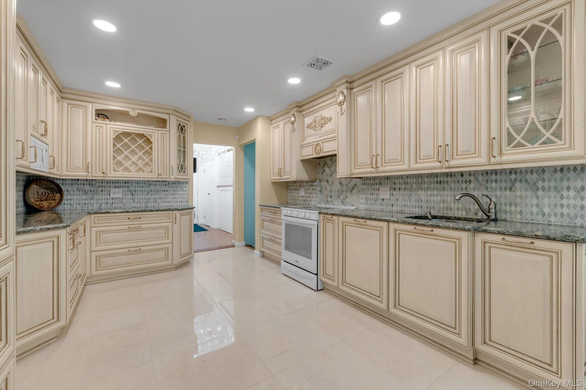 State-of-the-art kitchen remodeled in 2019 with premium Italian cabinetry, Italian tile and German hardware State-of-the-art kitchen remodeled in 2019 with premium Italian cabinetry, Italian tile and German hardware