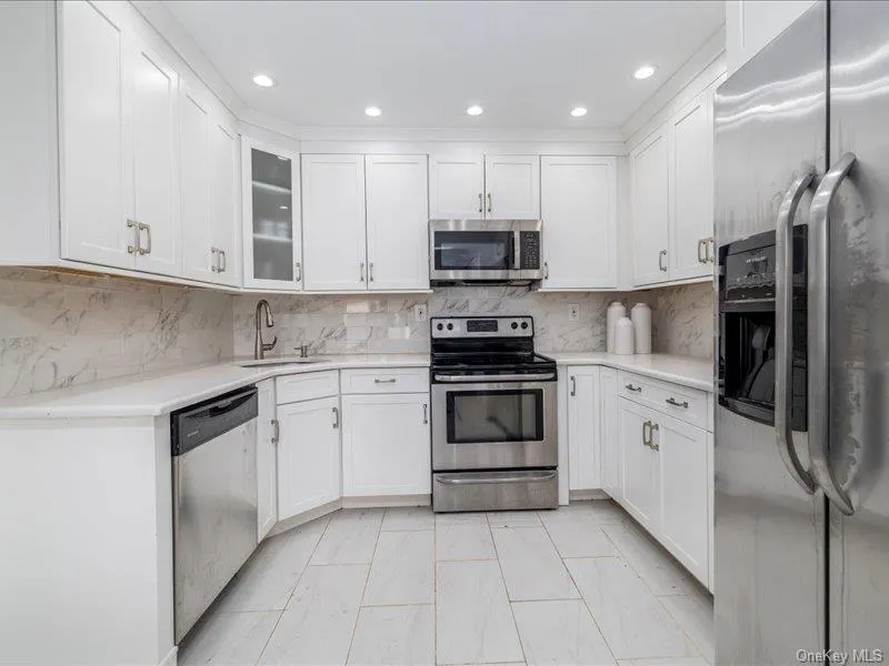 Updated Kitchen with Stainless Steel Appliances Updated Kitchen with Stainless Steel Appliances