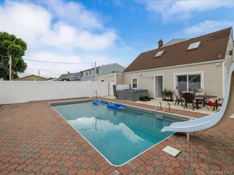 In-Ground Pool with Large Patio Area In-Ground Pool with Large Patio Area