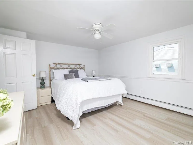 Large Primary Bedroom with Walk-in Closet Large Primary Bedroom with Walk-in Closet