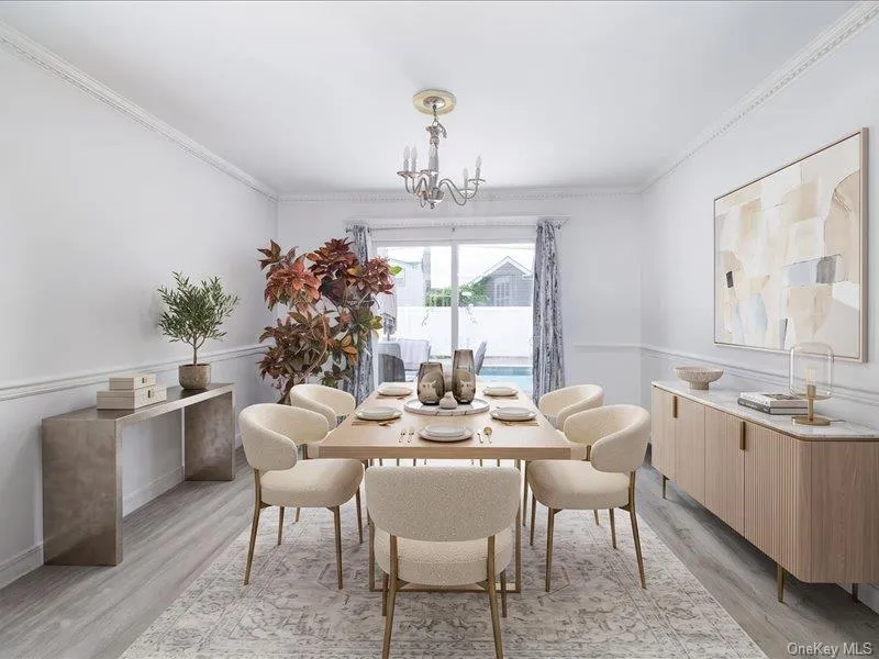 Virtually Staged Dining Room with Sliders to Backyard Virtually Staged Dining Room with Sliders to Backyard