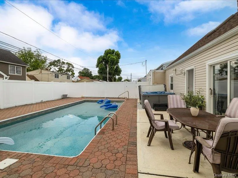 In-Ground Pool with Large Patio Area In-Ground Pool with Large Patio Area