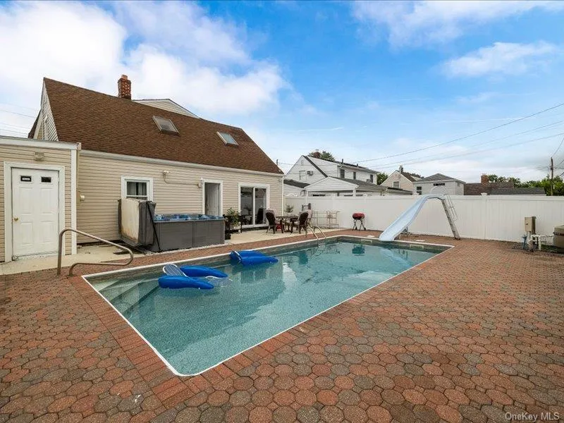 In-Ground Pool with Large Patio Area In-Ground Pool with Large Patio Area