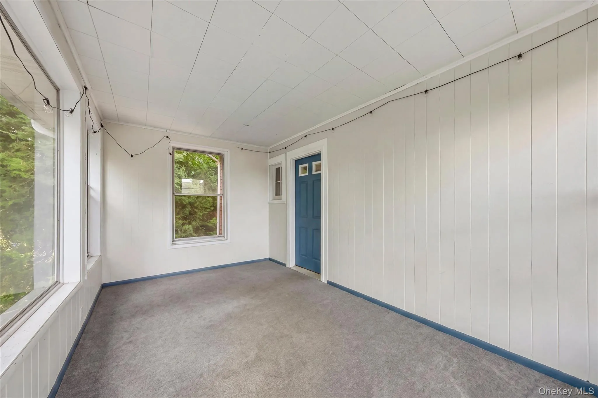 Rear Enclosed Porch(edited belongings removed) Rear Enclosed Porch(edited belongings removed)