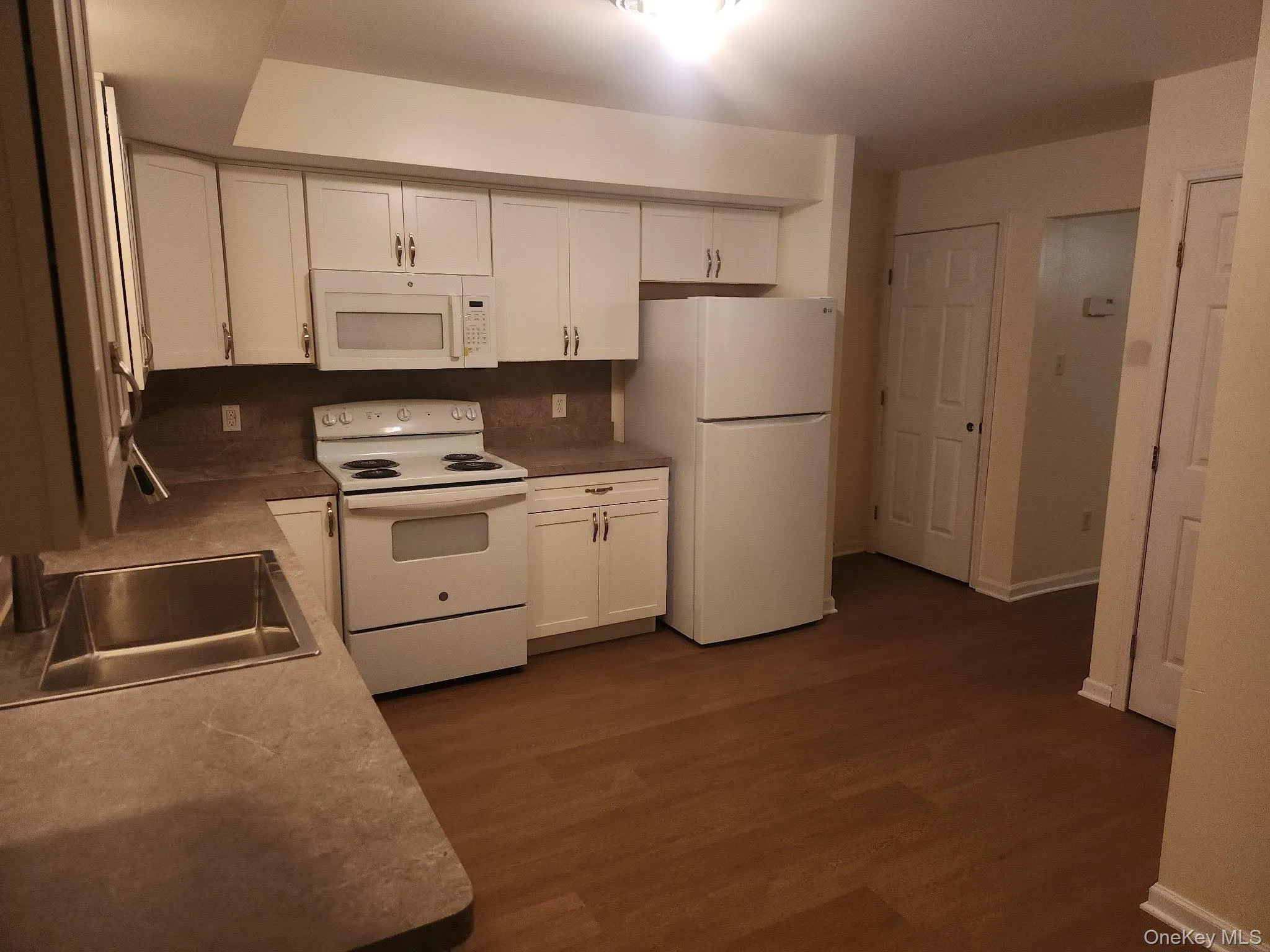 Updated appliances add to the convenience of this modern kitchen. Updated appliances add to the convenience of this modern kitchen.