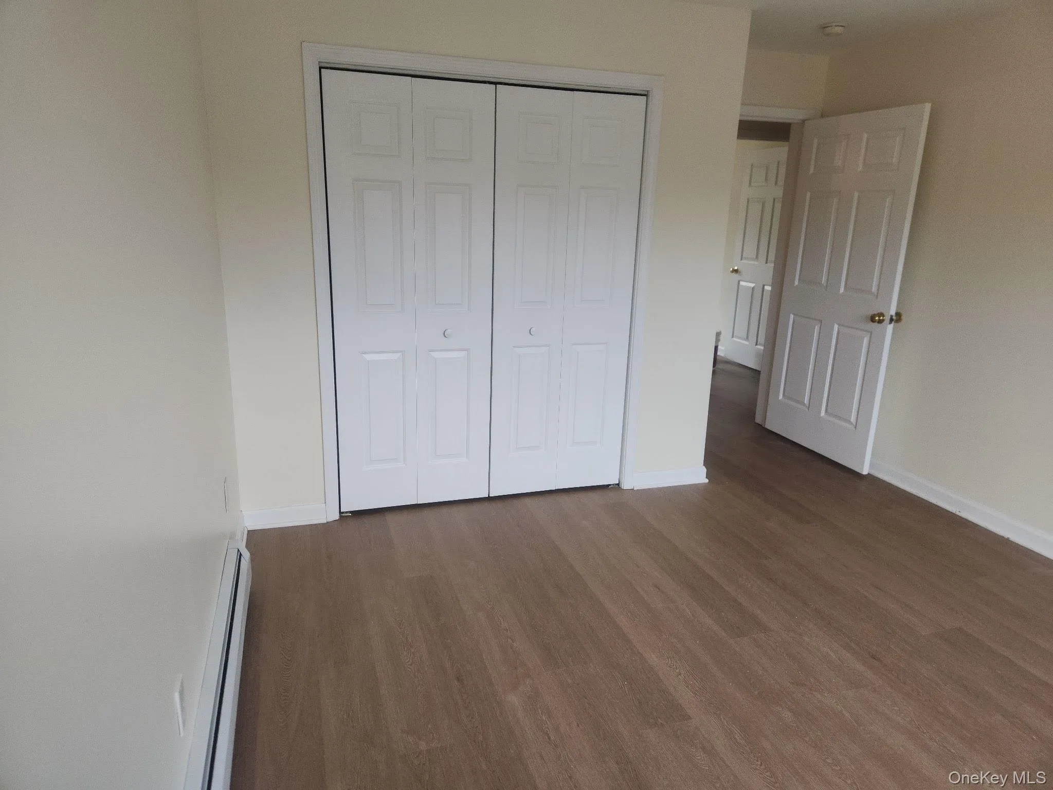 This second bedroom offers a large closet and view of the backyard. This second bedroom offers a large closet and view of the backyard.