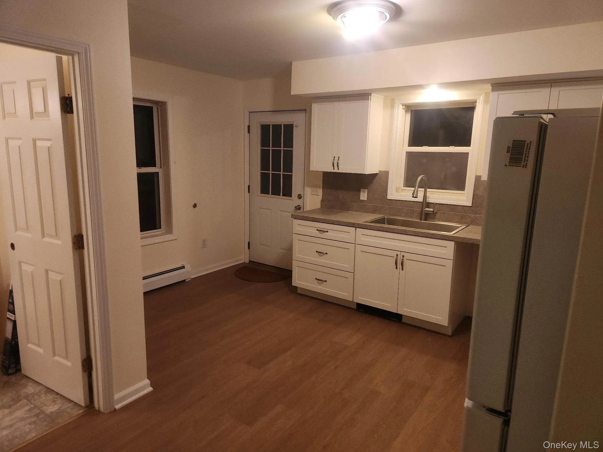 This eat in kitchen offers a dishwasher and has back deck access. The half bath is conveniently located between the kitchen and living room. This eat in kitchen offers a dishwasher and has back deck access. The half bath is conveniently located between the kitchen and living room.