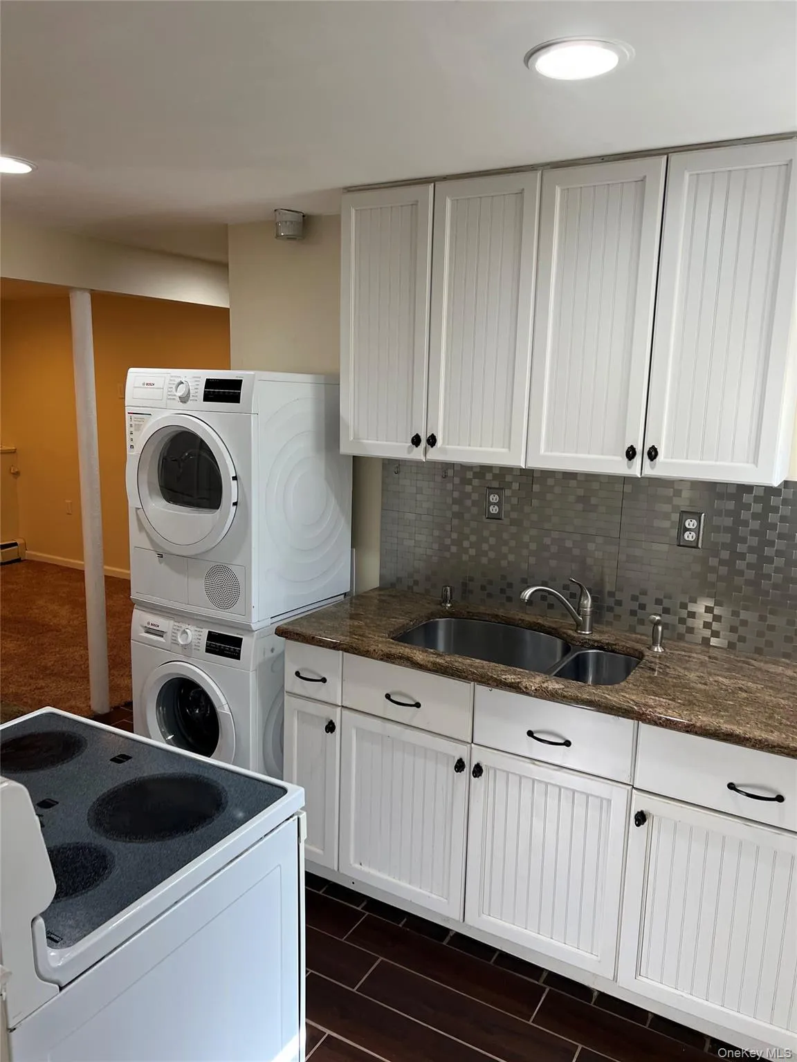kitchen showing washer and dryer kitchen showing washer and dryer