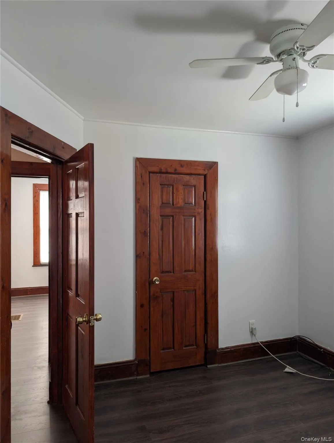Six panel solid doors for closet and to hallway, vinyl flooring and ceiling fan/light Six panel solid doors for closet and to hallway, vinyl flooring and ceiling fan/light