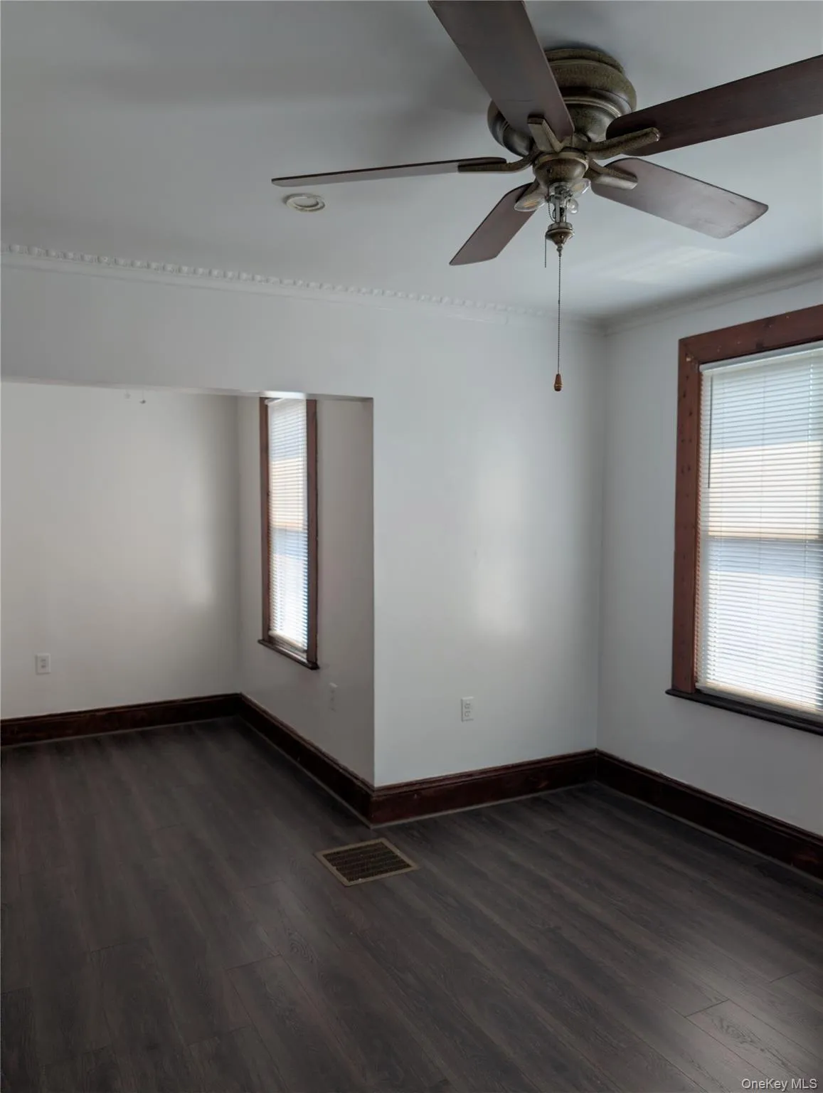 Vinyl flooring, multiple windows with blinds bring in natural light Vinyl flooring, multiple windows with blinds bring in natural light