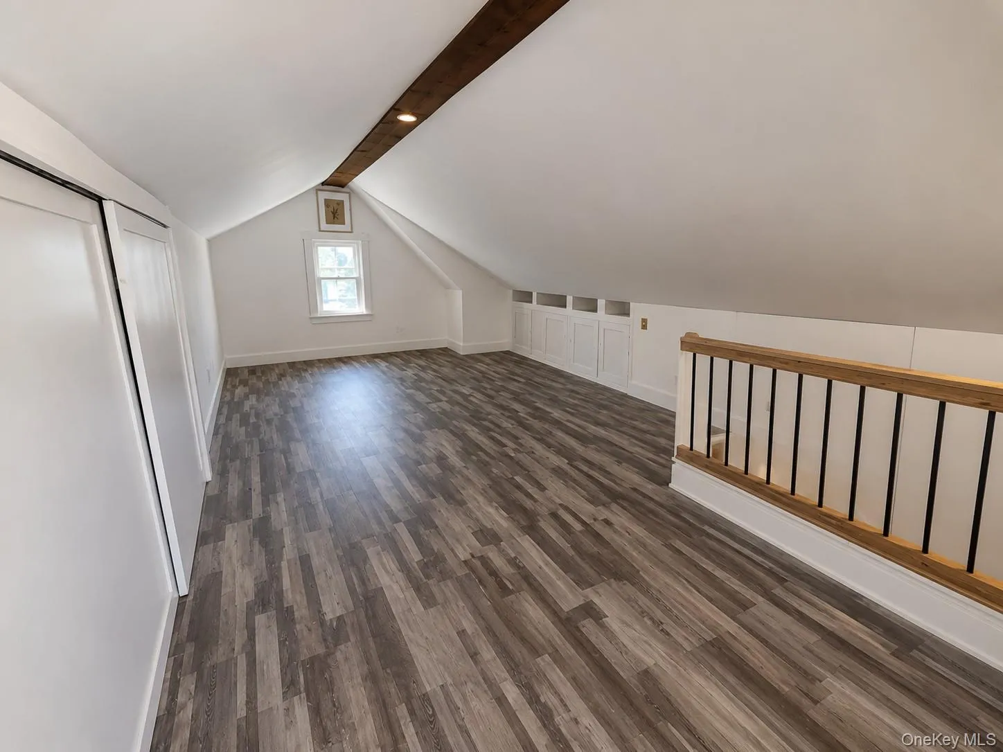Walk-up attic with ample storage space Walk-up attic with ample storage space