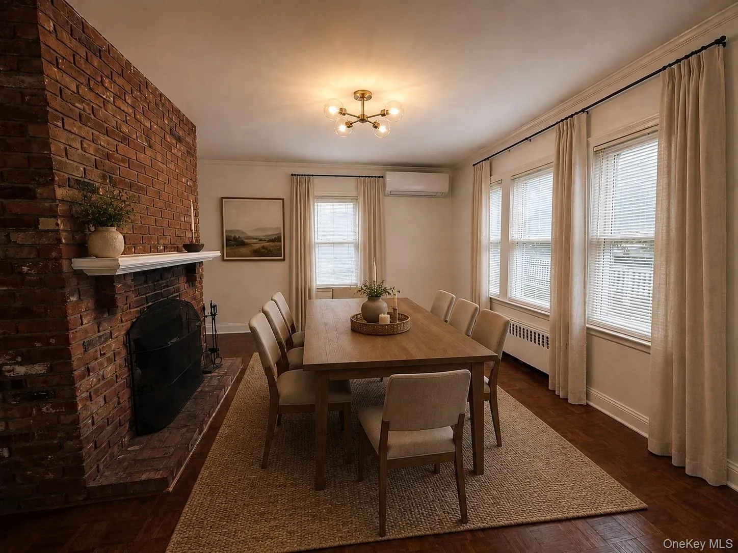 Dining area with fireplace, virtually staged Dining area with fireplace, virtually staged